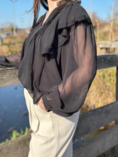 Blouse noir col v